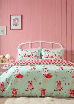 Zestaw dwustronnych poszewek na kołdrą w kolorze zielonym Święty Mikołaj.